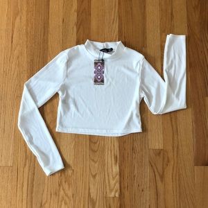 Petite high neck ribbed crop top